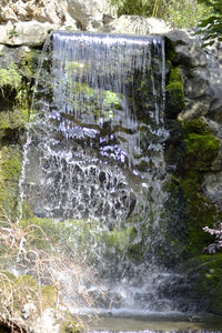 Close-up of water flowing through rocks