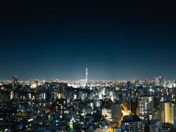 Illuminated cityscape at night
