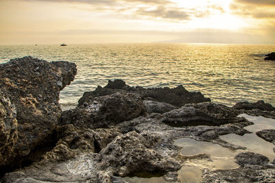 Scenic view of sea against sky during sunset