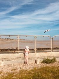 Full length of a man standing against the sky