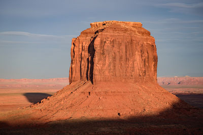 Rock formations on landscape against sky