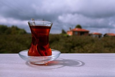 Close-up of tea in glass on table