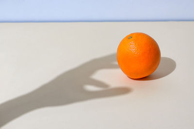 Orange fruit on table