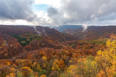 Scenic view of mountains against sky during autumn