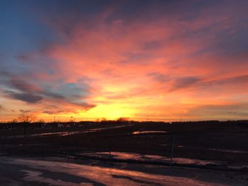 Scenic view of dramatic sky during sunset