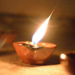 Close-up of lit candle