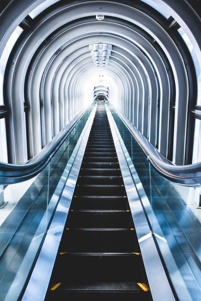 architecture, built structure, modern, low angle view, escalator, the way forward, diminishing perspective, vanishing point, architectural feature, day, travel destinations, no people, architectural column, repetition, tourism