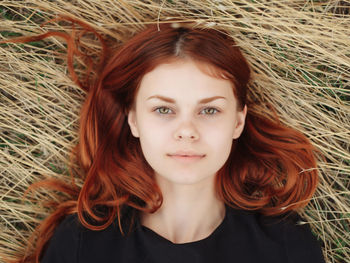 Portrait of young woman lying down