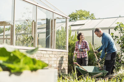 Couple working at community garden