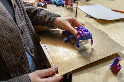 Midsection of man working at home