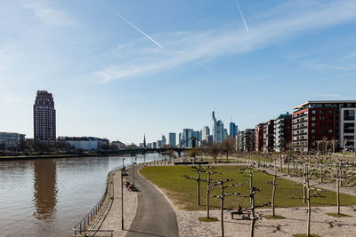 Panoramic view of river and buildings against sky