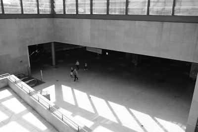 High angle view of people walking on building