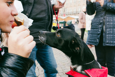 Midsection of man holding outdoors