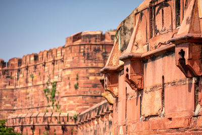 Low angle view of old building against sky