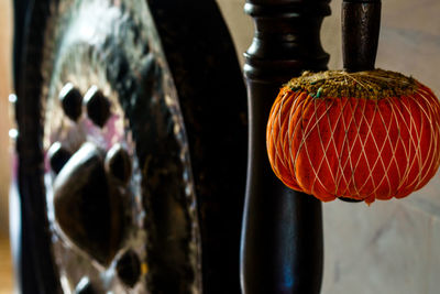 Close-up of multi colored ball hanging on metal