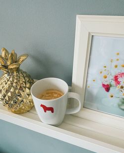 Coffee cup on table at home