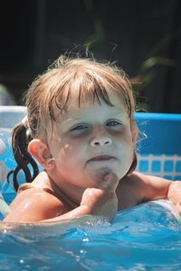 Portrait of boy in swimming pool