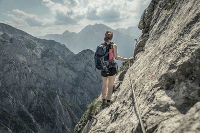 Tourists hiking on mountain