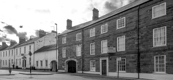 Exterior of old building in city against sky