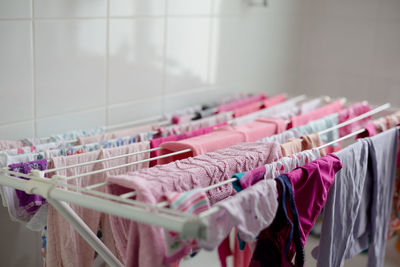 Close-up of clothes hanging on rack