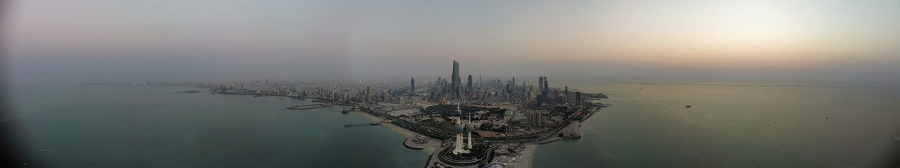 High angle view of city during sunset