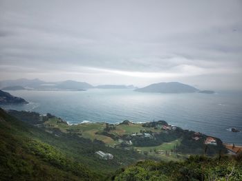 High angle view of bay against sky