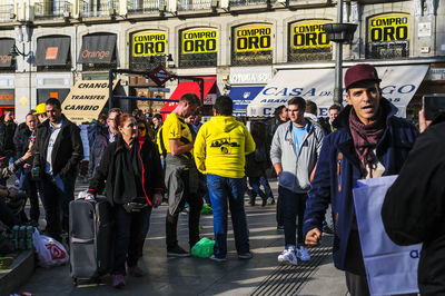 People walking on street in city