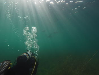 Person swimming in sea