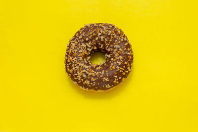 Close-up of bread on yellow background