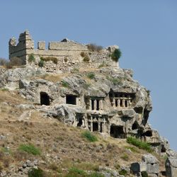 Low angle view of old ruin building against clear sky