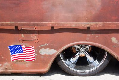 American flag on vintage vehicle