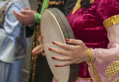 Close-up of woman holding hands