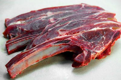 Close-up of meat on cutting board