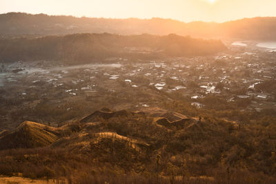 High angle view of landscape against sky during sunset