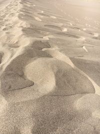 High angle view of sand on beach