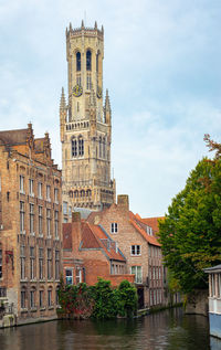 Scenic view of belfry tower, known as belfort in the historic town of bruges in flanders, belgium.