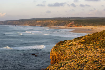 Scenic view of sea against sky during sunset