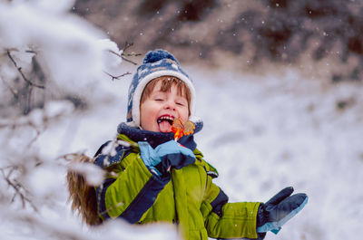 Portrait of cute girl in snow