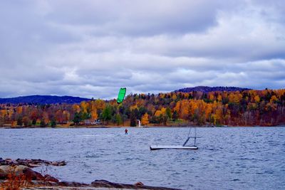 Scenic view of lake against sky during autumn