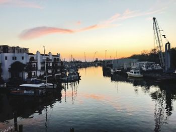 Boats moored at harbor