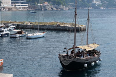 High angle view of sailboat moored in sea