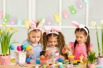 Children playing with toys on table