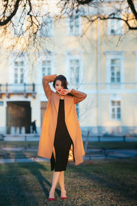 Young woman standing on street