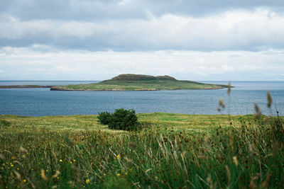 Scenic view of land against sky