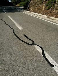 High angle view of shadow on road