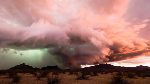 Lightning thunder and storm over city in purple light