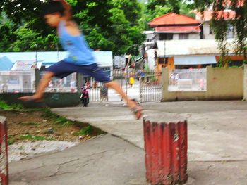 Woman jumping in park