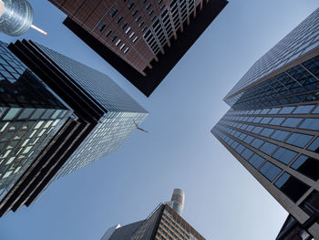 Low angle view of modern buildings against sky