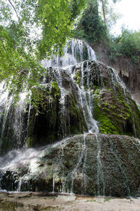 Low angle view of waterfall