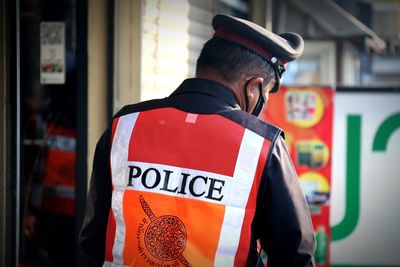 Rear view of policeman